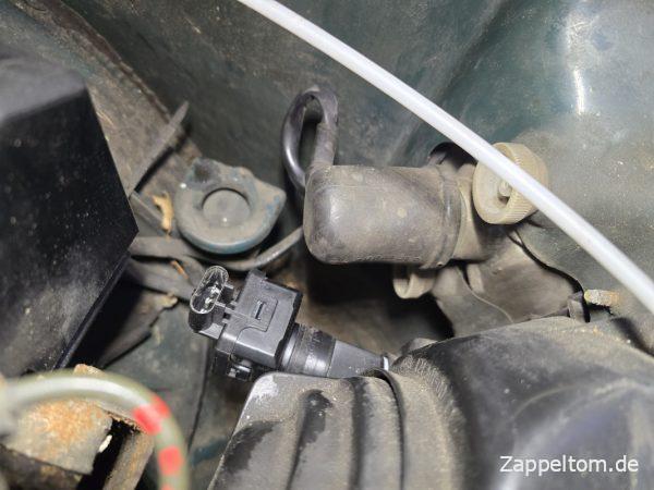 Eingebauter Stellantrieb für die elektrische Leuchtweitenregelung